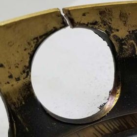 Abnormally Worn And Fractured Cage